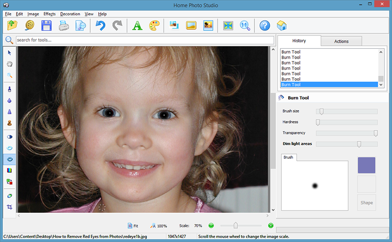 Apply the Burn tool to the pupils